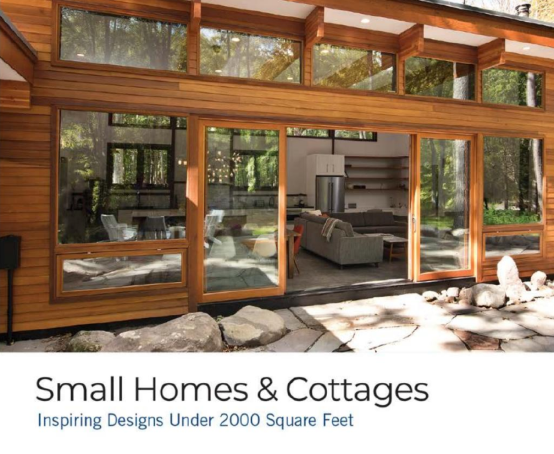 Modern small home with large glass windows.